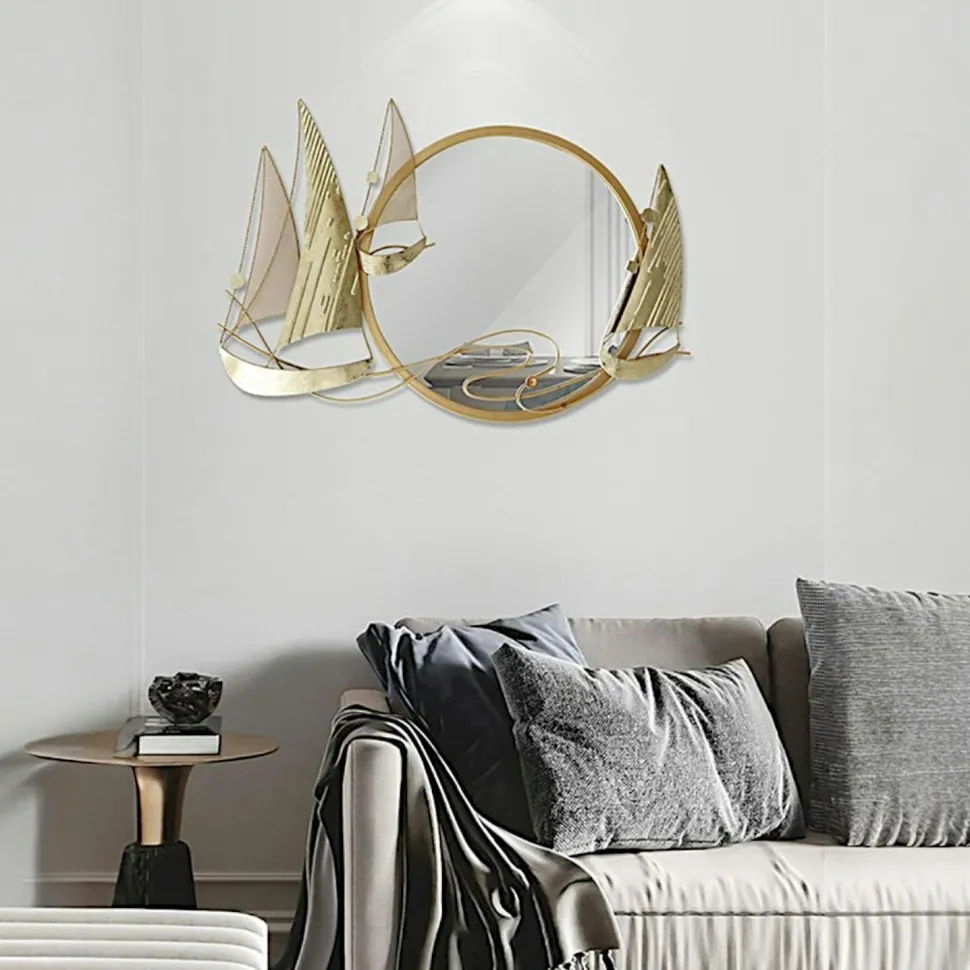 Décoration murale en métal avec miroir rond et bateaux dorés