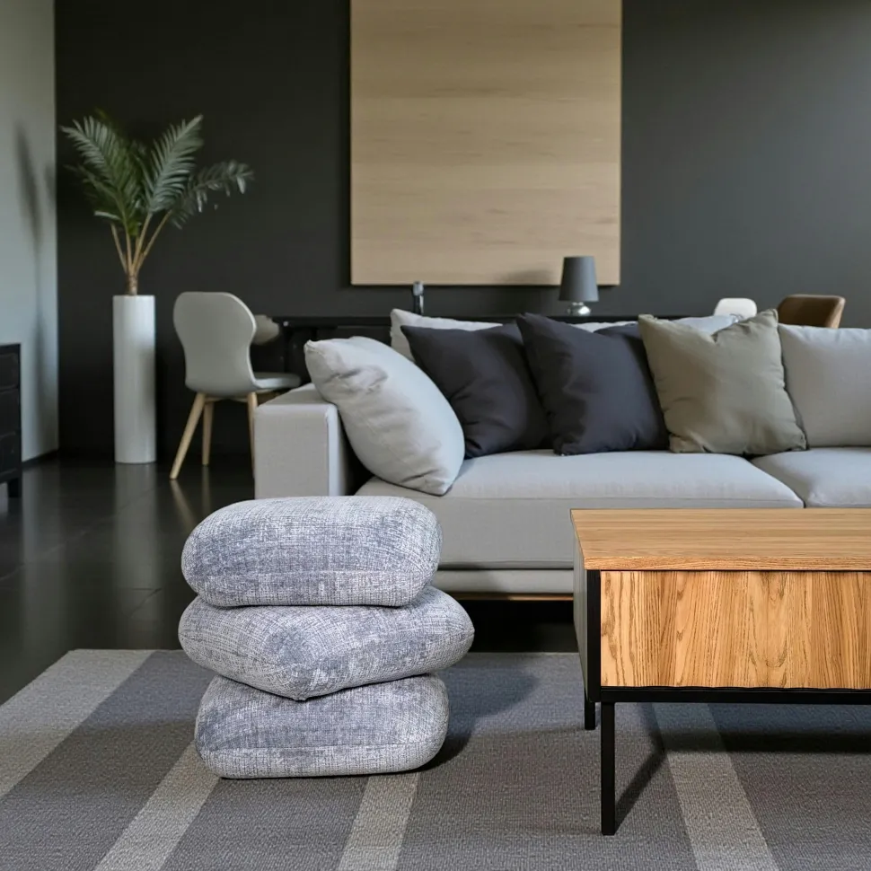 Pouf pivotant gris bleu effet coussins empilés IENA