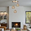 Suspension moderne 3 abat-jour tressés finition dorée AROSA